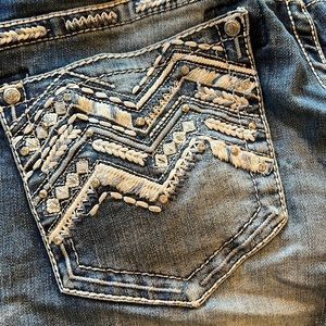 Grace in LA light wash jeans